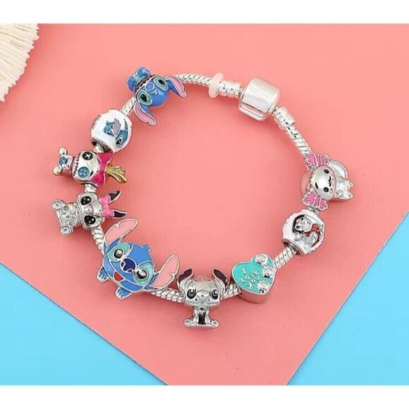 NEW Disney Lilo & Stitch Bracelet with 9 Charms & Pendant, Women’s Gift Jewelry - Picture 2 of 3